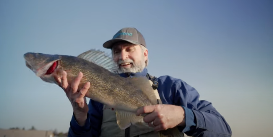 Lawrence Gunther of Blue Fish Canada holding a walleye